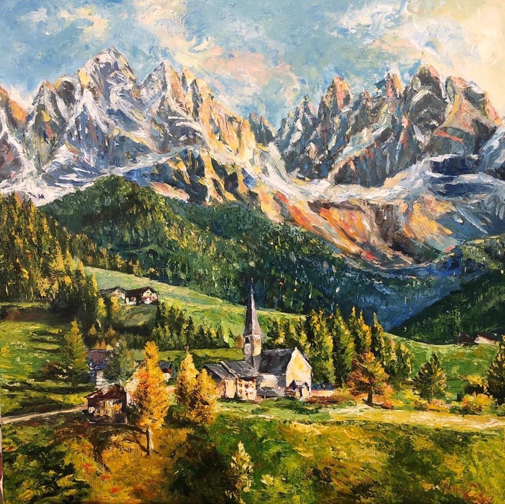 Dolomites church beneath jagged sunlit mountains