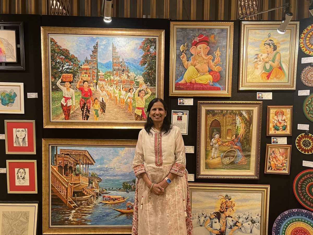 Vijay Laxmi Birla with her paintings at an exhibition