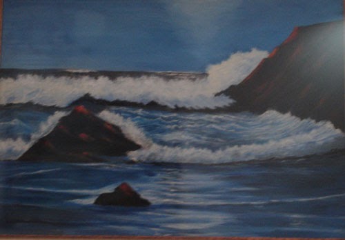 Dark blue night seascape with waves breaking over rocks
